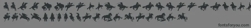 Cowboy-Schriftart – Schwarze Schriften auf grauem Hintergrund