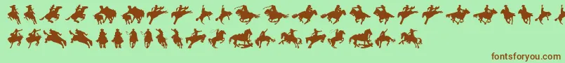 Cowboy-Schriftart – Braune Schriften auf grünem Hintergrund