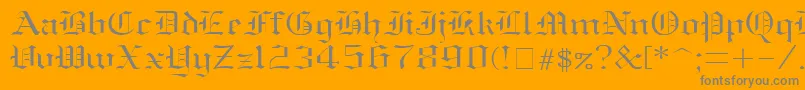 Oldenglish ffy-Schriftart – Graue Schriften auf orangefarbenem Hintergrund