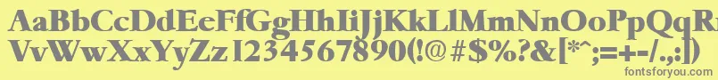 GaremondHeavy-fontti – harmaat kirjasimet keltaisella taustalla