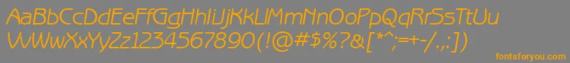 フォントBenguiatgothiccttItalic – オレンジの文字は灰色の背景にあります。