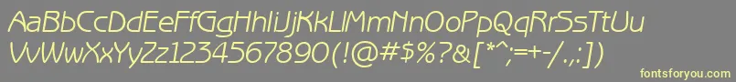 Шрифт BenguiatgothiccttItalic – жёлтые шрифты на сером фоне