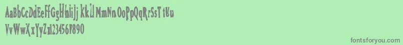Fonte Bird – fontes cinzas em um fundo verde