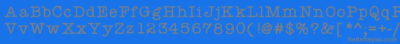 Czcionka Kbyourejustmytype – szare czcionki na niebieskim tle