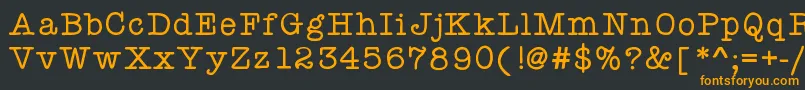 Шрифт Kbyourejustmytype – оранжевые шрифты на чёрном фоне