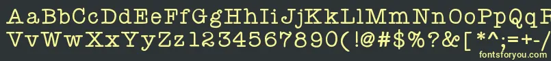フォントKbyourejustmytype – 黒い背景に黄色の文字