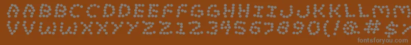 フォントLostmarb – 茶色の背景に灰色の文字
