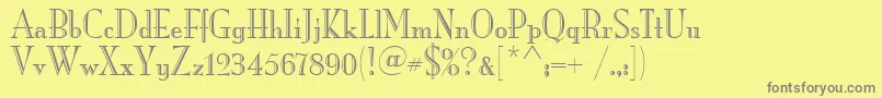 MonaLisaRecutItcTt-Schriftart – Graue Schriften auf gelbem Hintergrund