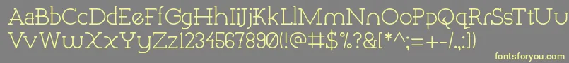 QuartzRegular Font – Yellow Fonts on Gray Background