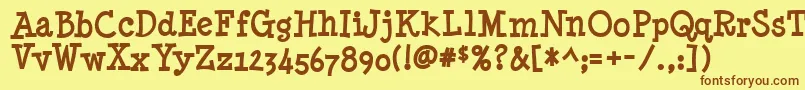 フォントMinynb – 茶色の文字が黄色の背景にあります。