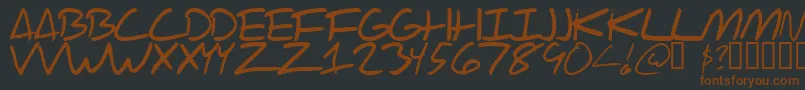 Scraotc-fontti – ruskeat fontit mustalla taustalla
