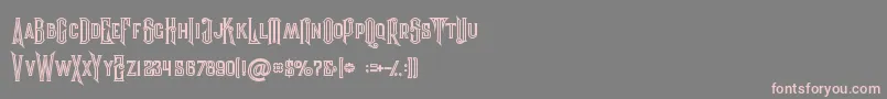 Evolveinline-fontti – vaaleanpunaiset fontit harmaalla taustalla