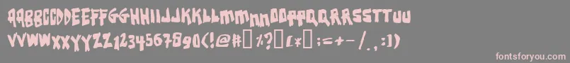 フォントEarthqua – 灰色の背景にピンクのフォント