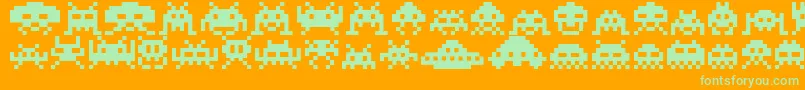Invaders Font – Green Fonts on Orange Background