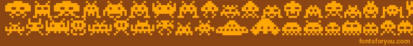 Weitere Informationen zur Invaders-Schriftart Invaders-Schriftart – Orangefarbene Schriften auf braunem Hintergrund