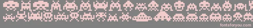 Подробнее о шрифте Invaders Шрифт Invaders – розовые шрифты на сером фоне