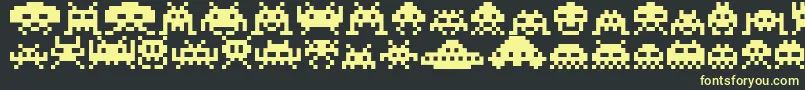 Invaders-Schriftart – Gelbe Schriften auf schwarzem Hintergrund