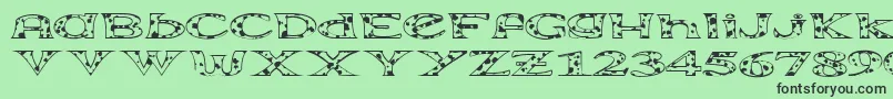 フォントExtravac – 緑の背景に黒い文字
