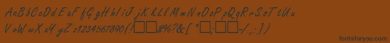 FreestyleRegular-Schriftart – Schwarze Schriften auf braunem Hintergrund