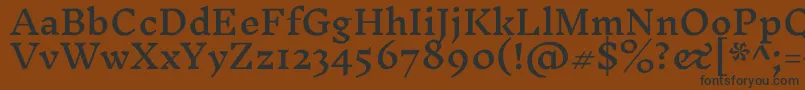 フォントInknutantiquaMedium – 黒い文字が茶色の背景にあります