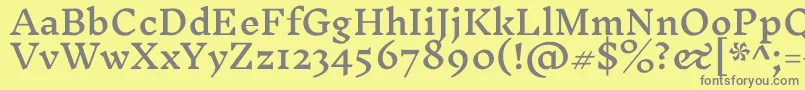 フォントInknutantiquaMedium – 黄色の背景に灰色の文字