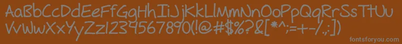 FhHyperboleBold-Schriftart – Graue Schriften auf braunem Hintergrund