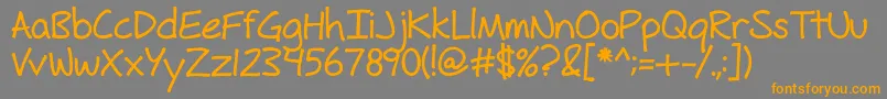フォントFhHyperboleBold – オレンジの文字は灰色の背景にあります。