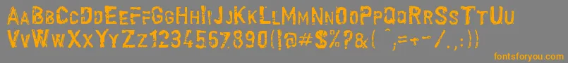 フォントScroonge – オレンジの文字は灰色の背景にあります。