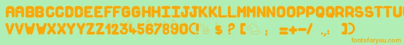 フォントSnowforsanta – オレンジの文字が緑の背景にあります。
