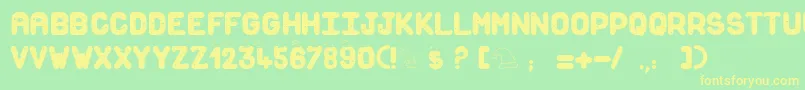Snowforsanta Font – Yellow Fonts on Green Background