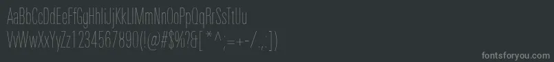 Fonte UniversNextProUltralightCompressed – fontes cinzas em um fundo preto