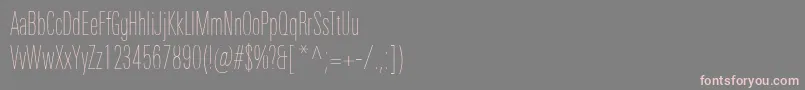 フォントUniversNextProUltralightCompressed – 灰色の背景にピンクのフォント