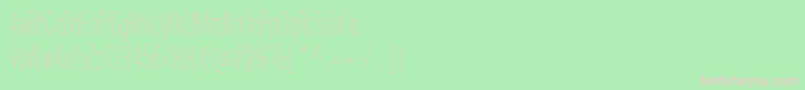 フォントUniversNextProUltralightCompressed – 緑の背景にピンクのフォント