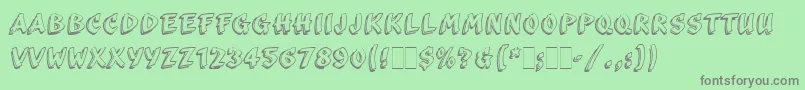 ScribaLetPlain-fontti – harmaat kirjasimet vihreällä taustalla