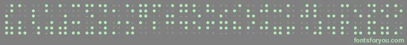 フォントBrailleAoe – 灰色の背景に緑のフォント