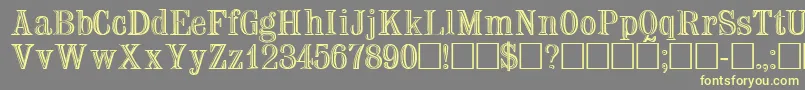 TrixsskRegular Font – Yellow Fonts on Gray Background