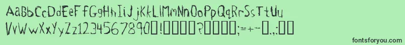 フォントTetanus – 緑の背景に黒い文字