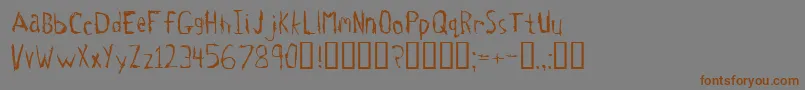 Tetanus Font – Brown Fonts on Gray Background