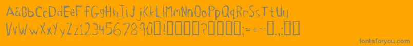 Tetanus-Schriftart – Graue Schriften auf orangefarbenem Hintergrund