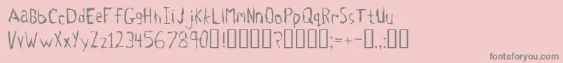 Tetanus-fontti – harmaat kirjasimet vaaleanpunaisella taustalla