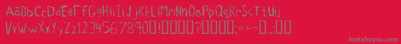 フォントTetanus – 赤い背景に灰色の文字