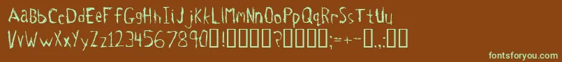 フォントTetanus – 緑色の文字が茶色の背景にあります。