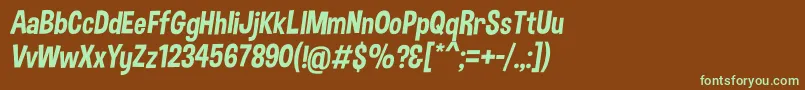 フォントDimboItalic – 緑色の文字が茶色の背景にあります。