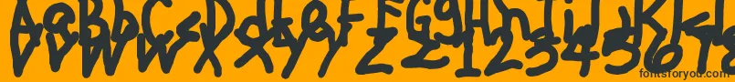 JehzlauConcepts Font – Black Fonts on Orange Background