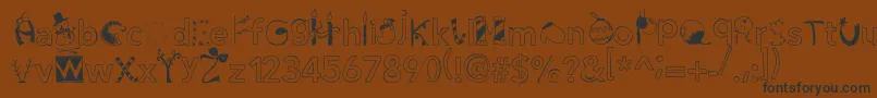 Christmasgocdani Font – Black Fonts on Brown Background