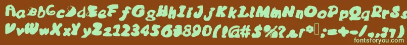 フォントMessybubble – 緑色の文字が茶色の背景にあります。