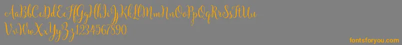 Police YulindaScriptDemo – polices orange sur fond gris