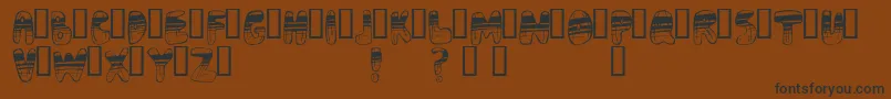Adrenoch Font – Black Fonts on Brown Background