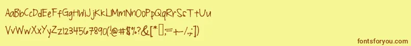 フォントSirislly – 茶色の文字が黄色の背景にあります。