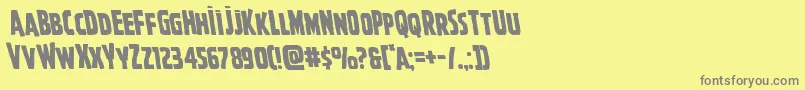 Ghoulishintentleft-fontti – harmaat kirjasimet keltaisella taustalla